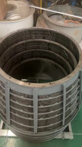 Basket centrifuge screen wedge-wire slot construction, coal dewatering, and John Finlay manufacturing facility.