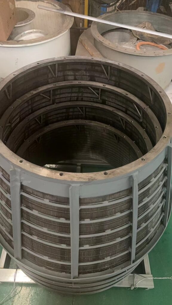 Basket centrifuge screen wedge-wire slot construction, coal dewatering, and John Finlay manufacturing facility.