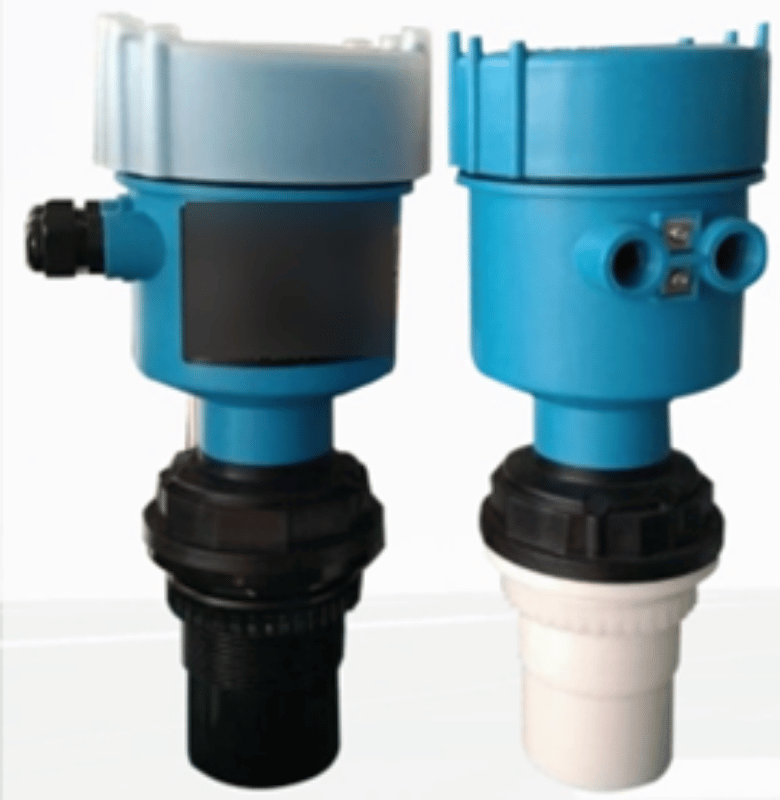 Ultrasonic level transmitter units, standard and compact housing variants.