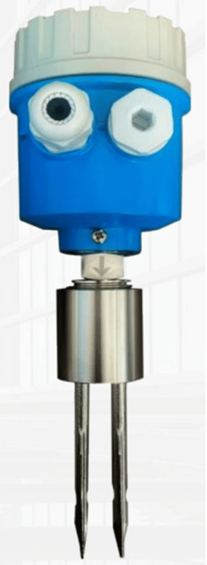 piezo-driven tuning fork level switch with dual-prong sensing element. Confirmed real, not stock.