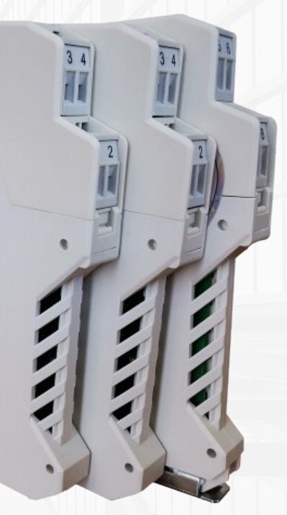 Three plug-in signal isolator modules with terminal numbers, DIN rail mounted, John Finlay India